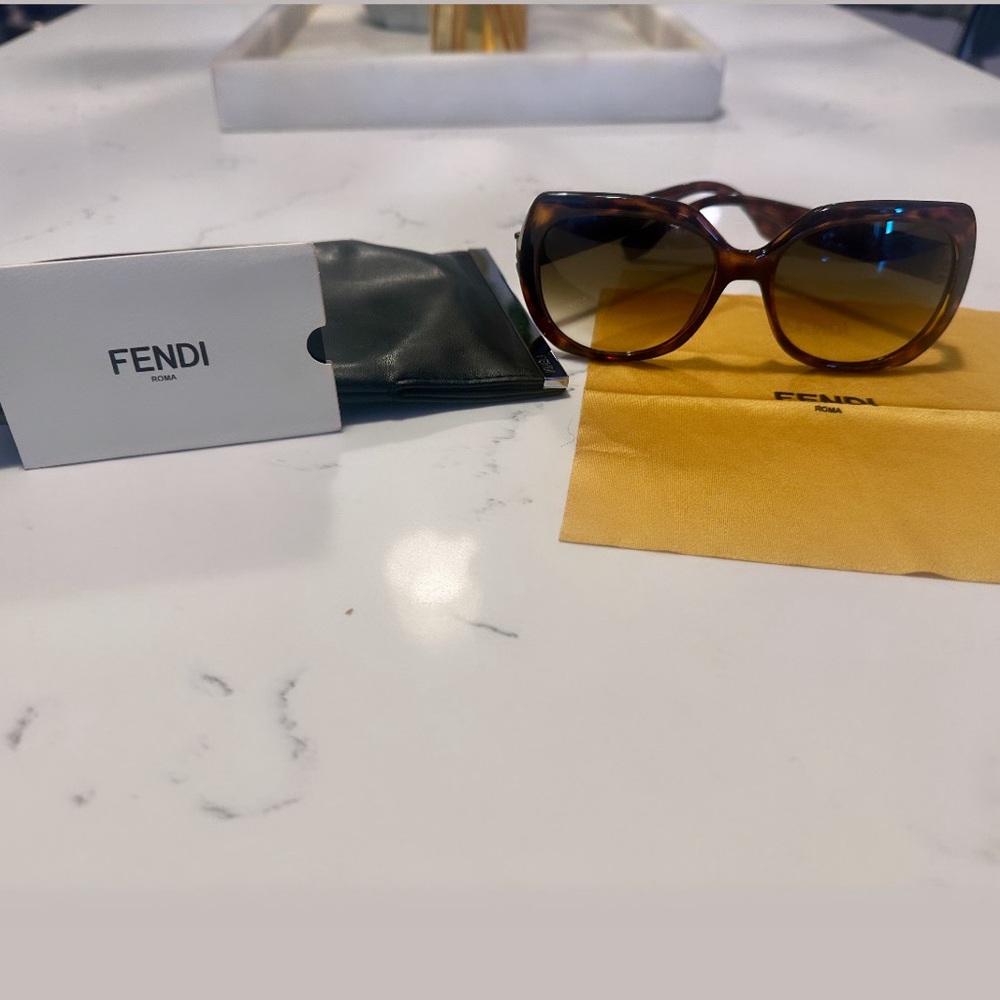 Women’s Fendi FF brown sunglasses with crystals.
